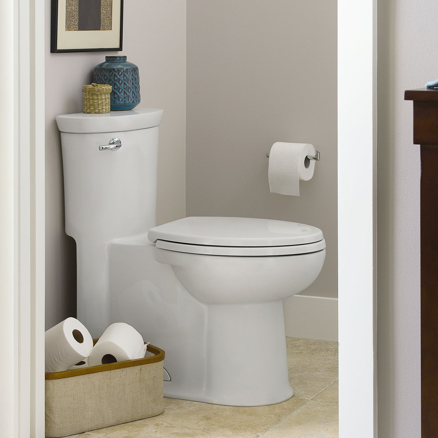 American Standard Tropic One-Piece 1.28 gpf/4.8 Lpf Chair Height Elongated Toilet With Seat